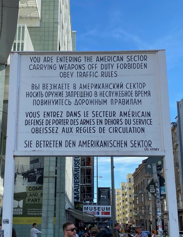 Checkpoint Charlie A sign with information at Checkpoint Charlie, in multiple languages.