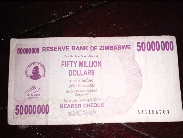 Fifty million Zimbabwean dollars banknote with the Reserve Bank logo and date.
