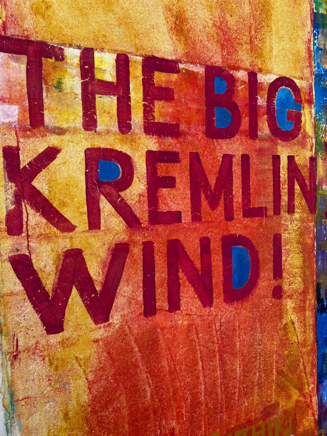 The Big Kremlin's Wind Colourful background with bold text reading "THE BIG KREMLIN WIND!" in vibrant letters.