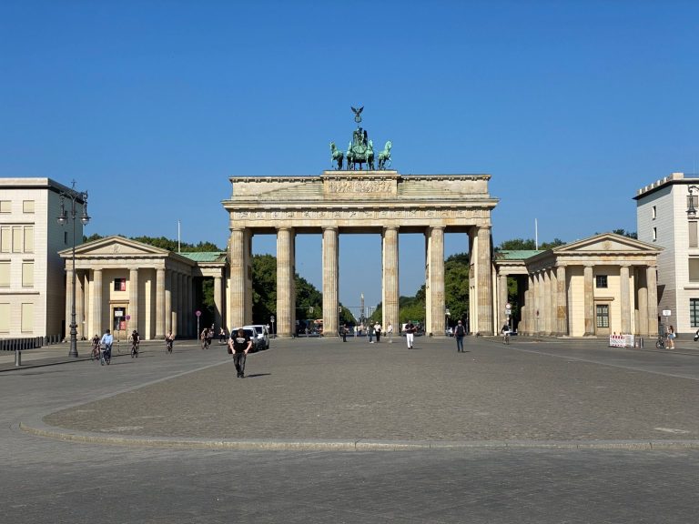 Brandenburg Gate Brandenburg Gate in Berlin, set against a clear blue sky.