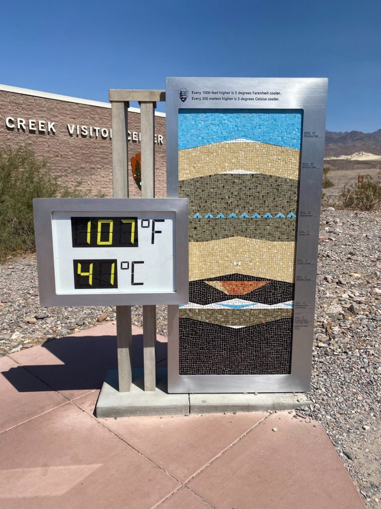 Temperature display showing 107°F (41°C) alongside a geological cross-section diagram.