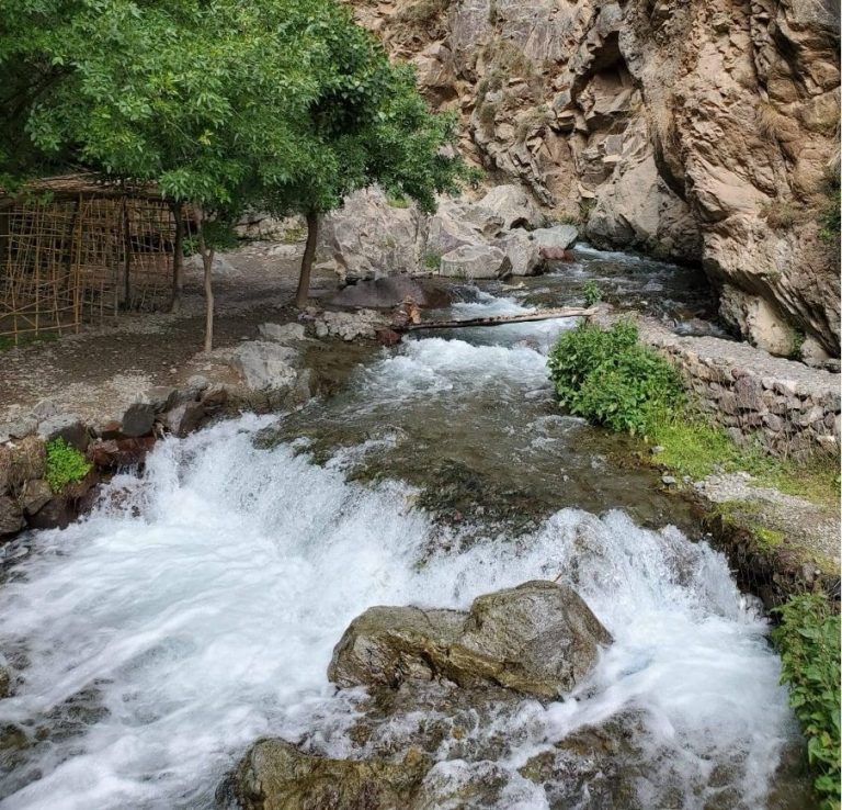 A river in the valley on the descent from Mount Toubkal A river in the valley on the descent from Mount Toubkal