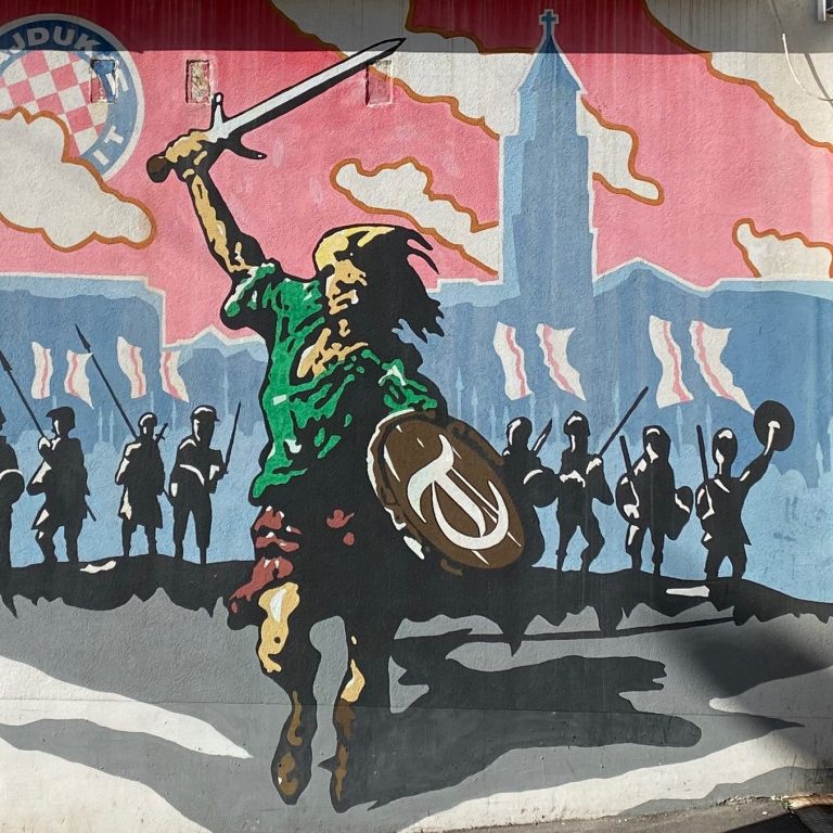 Hajduk Split Artwork A warrior with a sword and shield leads a group of soldiers in a historical scene.